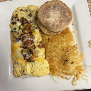 Special omelette - bacon spinach and tomatoes.
