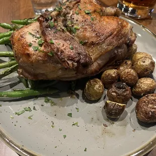 Half chicken with green beans and roasted potatoes