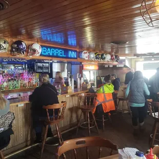 people sitting at the bar