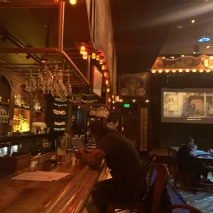  man sitting at a bar