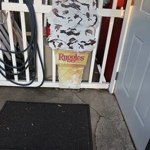 an ice cream cone and a doormat