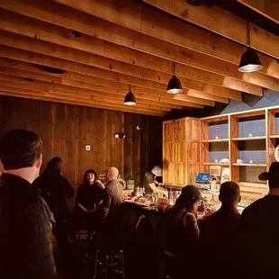 a group of people sitting around a table