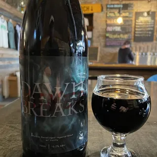 a bottle and a glass