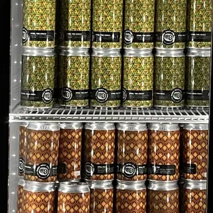 a refrigerator full of cans of beer