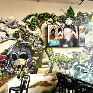 a mural of a dragon and a tiger