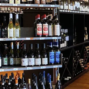 shelves full of wine bottles