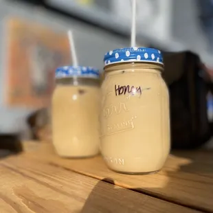 two jars of coffee on a table