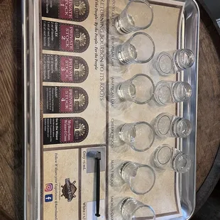 a tray of wine glasses