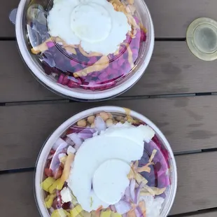 two bowls of food on a table