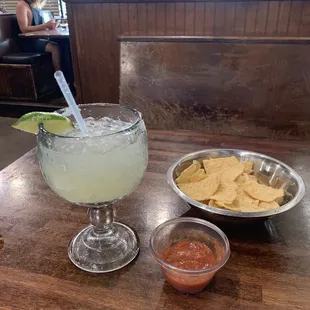 Margarita, salsa and chips. Great drink and amazing salsa. Maria is the best server, ask for her!