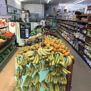 bananas and oranges on display