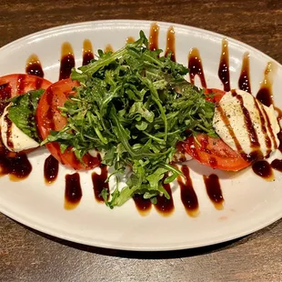 Generous portion of my Heirloom Tomato &amp; Mozzarella arugula salad