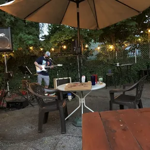 a man playing a guitar