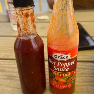 The unlabeled hot sauce is made special and contains scorpion pepper. Super hot and delicious! The hot sauce on the right is crazy good too!