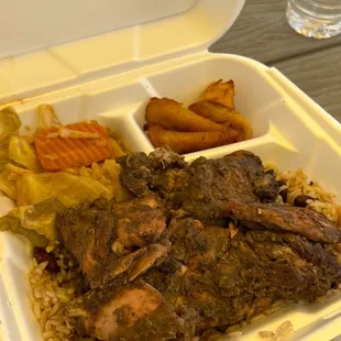 Jerk chicken with plantains and veg over a bed of rice and beans. So, so good!