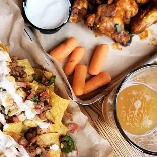 Pulled pork nachos, spicy wings, and a hazy ipa