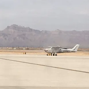 a small plane on the runway