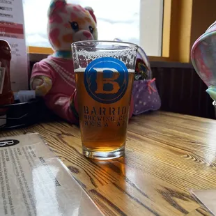 Kid friendly and they can watch airplanes from the table.  Not in the airport but right next to it.