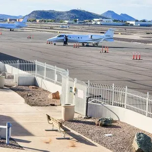 a plane on the tarmac at an airport