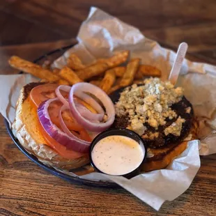 a burger and french fries in a basket