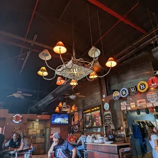 Couple of smaller TV Screena around bar. Also another bar about same size on other side of restrooms.