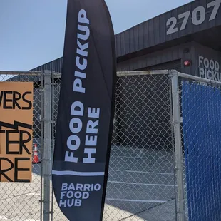 a chain link fence and a sign