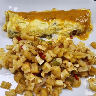 Omelette with ham bell pepper Jalapeños and Ranchero sauce