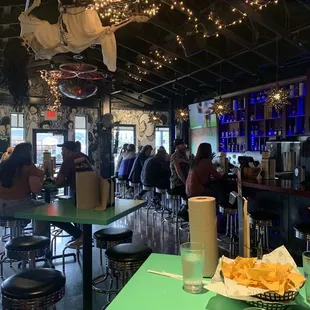 Inside by the bar; there is also outdoor seatinf