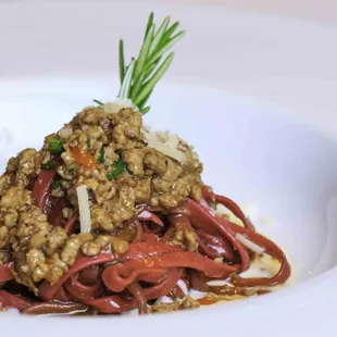 Red Beet Pasta Quail Ragu on a bed of Taleggio Fondue!