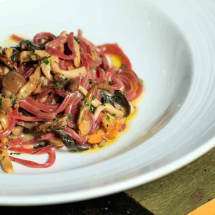 Red Beet Tagliolini with foraged wild  mushrooms