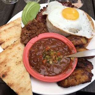 Bandeja Paisa, good but not very authentic, chicharrones weren't crispy, didn't like a flavor in the rice/egg, possibly the oil used?