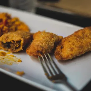 a plate of food and a fork
