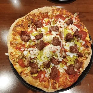 Medium pepperoni, sausage, onions &amp; banana pepper deliciousness!