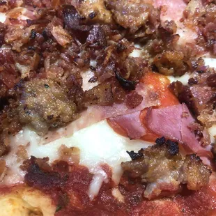 Just look at the toppings on that MEAT SUPREME PIZZA. Delicious!