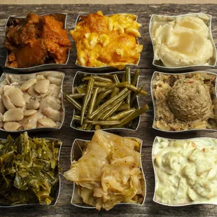 Assortment of Vegetables: Sweet Potato, Macaroni and Cheese, Mashed Potato, Green Beans, Lima Beans, Greens, Cabbage, Potato Salad