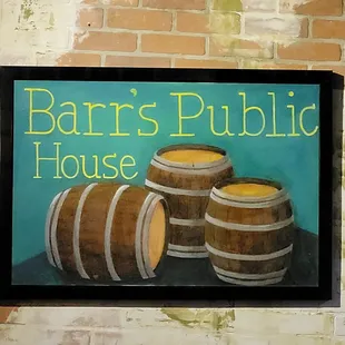 three barrels and a brick wall