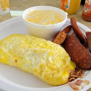 Ham &amp; Cheese Omelet with grits and a Side of Spicy Smoked Sausage