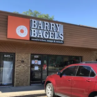a car parked in front of the store