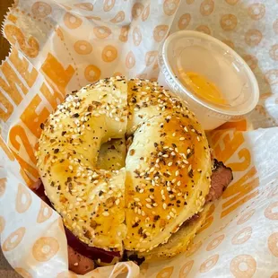  a bagel with a side of mustard