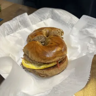Cinnamon vanilla bagel with sausage egg and bacon