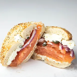 Lox, red onion, capers with scallion cream cheese on a sesame bagel.
