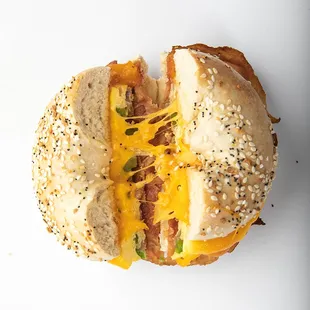 Eggel with bacon and cheddar on an Everything Bagel.