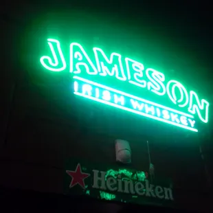 a neon sign for a bar