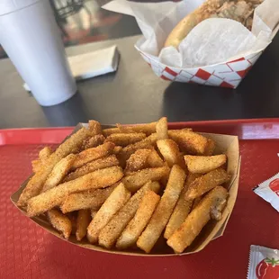 a tray of cheesesteaks