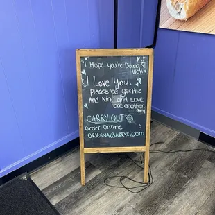 a chalkboard with a message on it