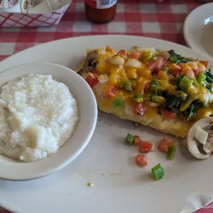 Veggie omelet and grits