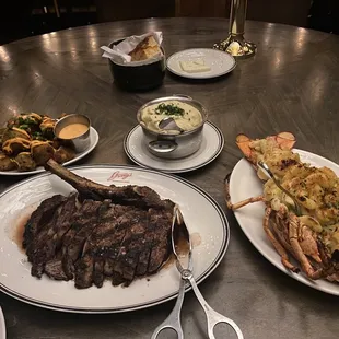 Ribeye, mashed potatoes, lobster mac and cheese and bang bang cauliflower.