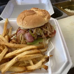 Bacon Cheese Burger with Grilled Onions and French Fries