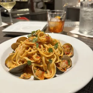Pasta with clams in a spicy red sauce