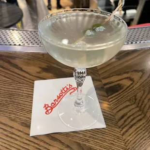 Dirty gin martini with bluecheese olives